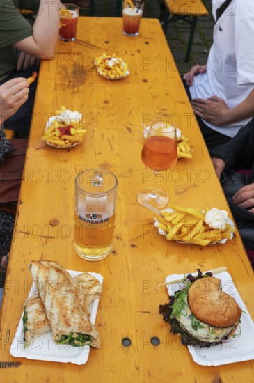 Food and drinks on a beer table at a folk festival, Bavaria, Germany, Europe