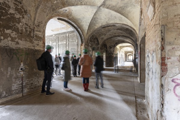 Group of visitors in the Alpenhaus, Beelitz-Heilstätten, former lung sanatorium, military hospital