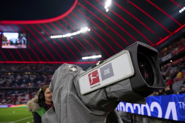 TV camera, camerawoman, stadium interior, SportCAST logo, Bundesliga, Allianz Arena, Munich,