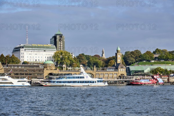 St. Pauli Landing Bridges on the River Elbe, with the Bismarck Monument in the background, Hamburg,