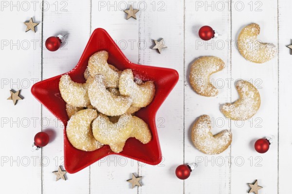 Top view of crescent Christmas cookies called 'Vanillekipferl', a traditional Austrian or German