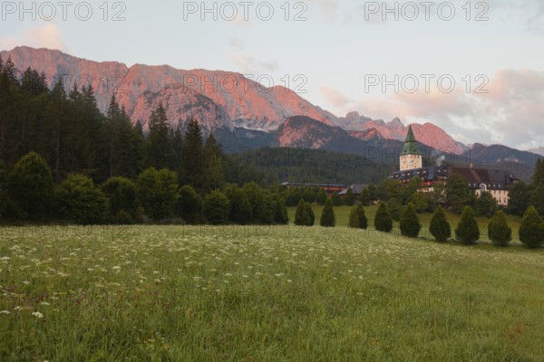 Alpenglow at Schloss Elmau, Wetterstein mountains in the morning light