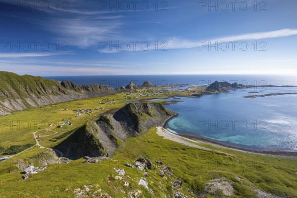 Coast and view of the village of Sørland on the island of Værøy, Vaeroy, Lofoten, Norway, Europe