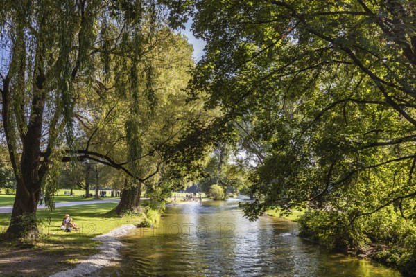People at the Eisbach in the English Garden, Munich, Bavaria, Germany, Europe