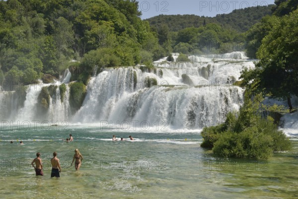 Tourists taking a bath at the Skradinski buk waterfalls, Krka National Park, Šibenik-Knin County,