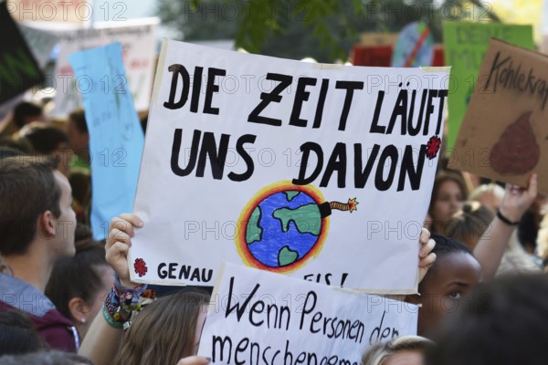 Heidelberg, Germany, September 2019: Protest sign cardboard saying Time is running out in German