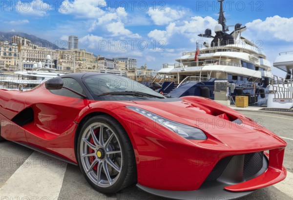 Monte Carlo, Monaco, France, 22 June, 2022: Monte Carlo marina with luxury yachts and cars in