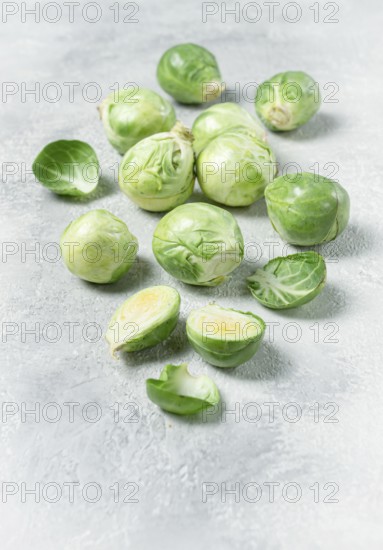 Fresh Brussels sprouts, raw, top view, on a gray table, no people