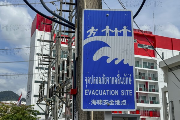 Tsunami Hazard Zone. Warning sign, signposting of escape routes in the event of another seaquake.