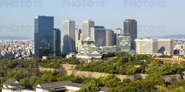 Osaka Castle Castle from above with the skyline skyscrapers panorama in Osaka, Japan, Asia