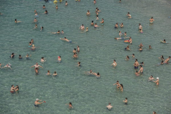 Tourists at the Playa Mal Pas, Benidorm, Province of Alicante, Costa Blanca, Spain, Europe