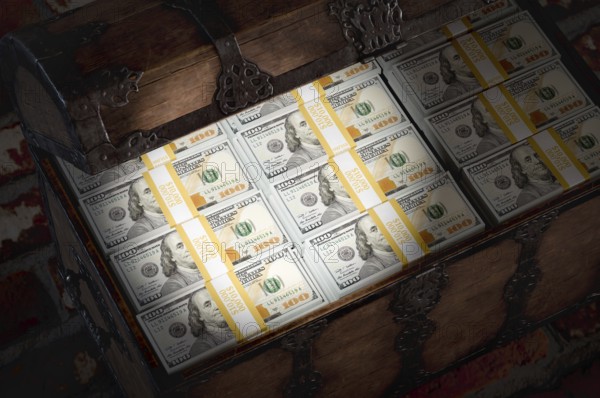 Flashlight shining on a treasure chest filled with millions of dollars in cash in a dark room