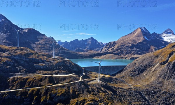 At the Griessee reservoir, wind turbines at the Gries wind farm, Nufenenpass, Obergoms, Valais,