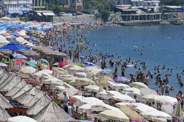 Bathing beach, pebble beach, umbrellas, crowded, holiday, summer holiday, resort, Mediterranean,