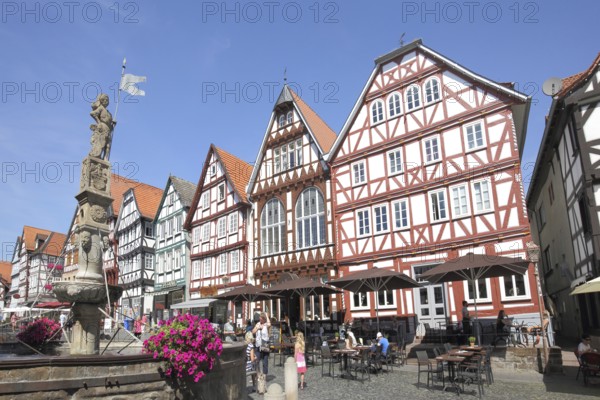 Half-timbered houses with market fountain, Rolandsbrunnen, market square, Fritzlar, Hesse, Germany,