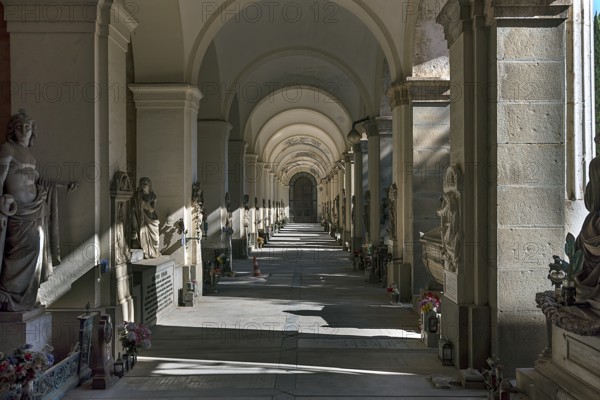 Arcaded gallery with tombs in the Monumental Cemetery, Cimitero monumentale di Staglieno), Genoa,
