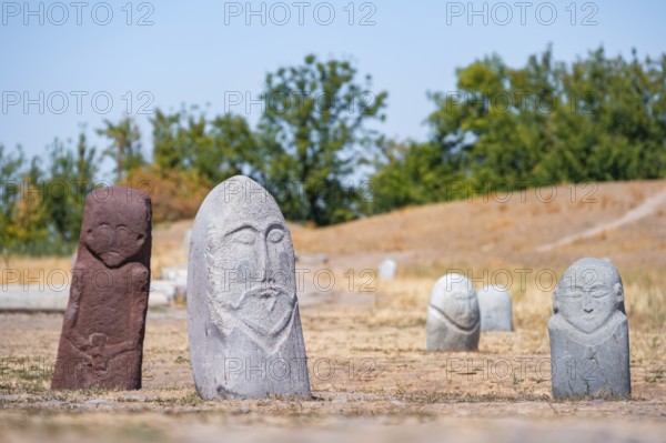 Balbals, historical gravestones in the shape of human faces, near Tokmok, Chuy, Kyrgyzstan, Asia