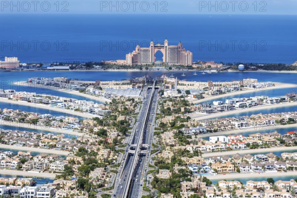 The Palm Jumeirah with Atlantis Hotel artificial island from above in Dubai, United Arab Emirates,