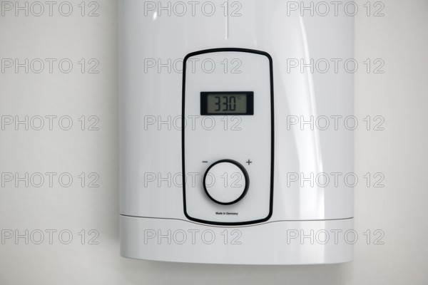 Instantaneous water heater for hot water Shower for showering Washbasin Bidet is set to low energy