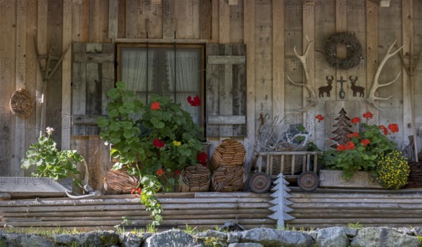 Wooden house with various decorations, Garmisch-Partenkirchen, Bavaria, Germany, Europe