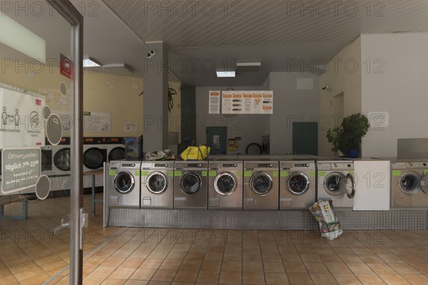 View into a launderette, Erlangen, Middle Franconia, Bavaria, Germany, Europe