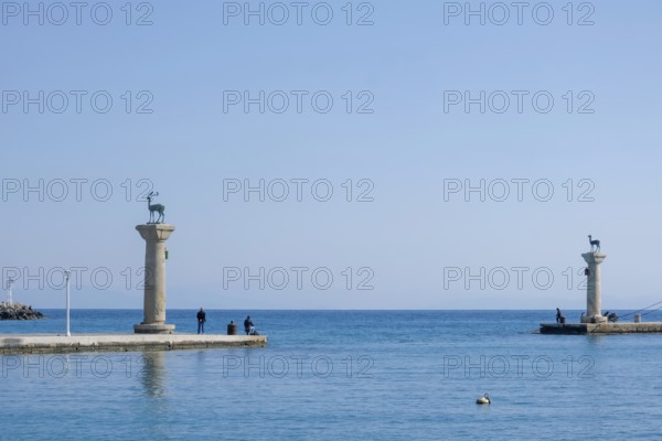 Elafos and Elafina, stag and hind, sculptures on columns, harbour entrance Mandraki harbour,