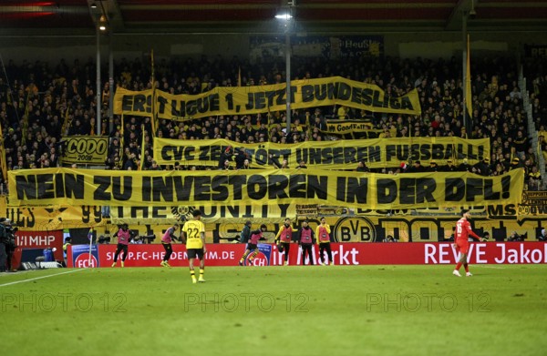 Banner, banner, poster, banner, fan action, protest against investors in the DFL German Football