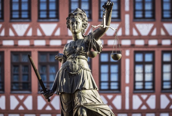 Justitia, Roman goddess of justice. Römerberg, city centre of Frankfurt am Main, Hesse, Germany,