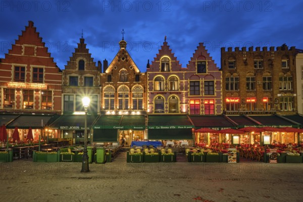 Bruges, Belgium, May 29, 2018: Bruges Grote markt square famous tourist place with many cafe and