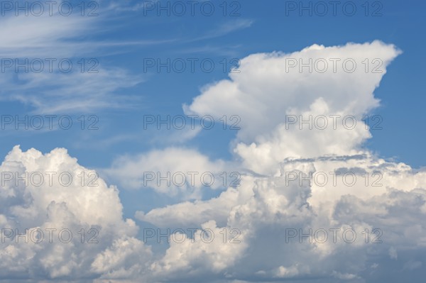 Cumulonimbus, thundercloud against blue sky, Germany, Europe