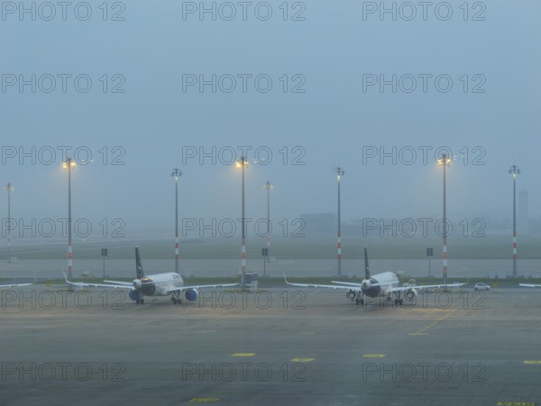 Berlin BER airport, tarmac in the morning in the haze, November fog, Berlin, Germany, Europe