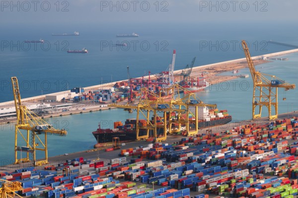 BARCELONA, SPAIN, APRIL 17, 2019: View of cargo ship unloading in Barcelona port terminal with