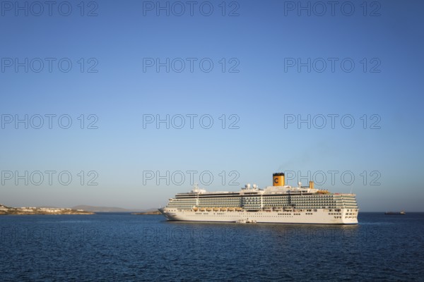 MYKONOS, GREECE, MAY 29, 2019: Cruise liner ship Costa Luminosa in Mediterranea sea near Mykonos