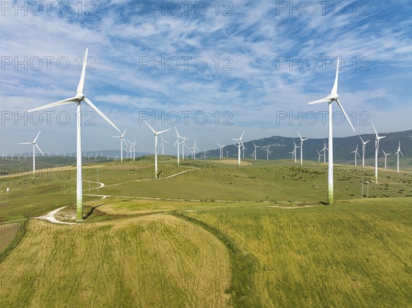 Windmills on a wind farm near Zahara de los Atunes, aerial view, drone shot, Cádiz province,
