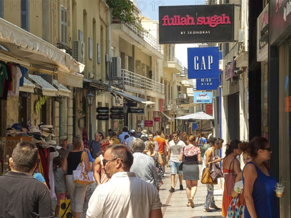 City centre, old town, pedestrian zone, many passers-by, shops, signs, Heraklion, capital, island