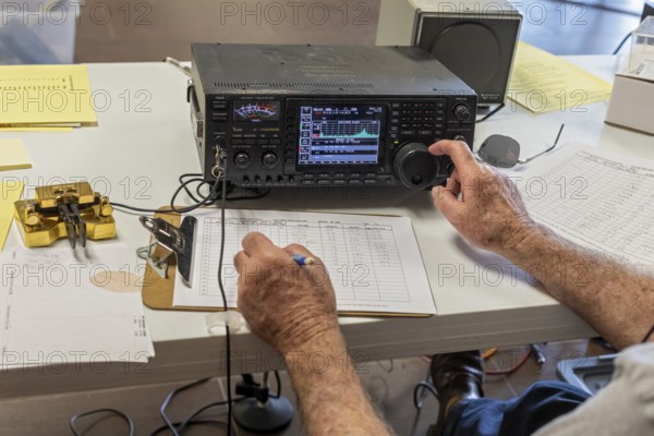 Bosque Farms, New Mexico, Paul Ridley, an amateur radio operator, operates a Morse code station