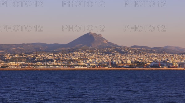 Coastline, mountain, sea, view from sea, blue cloudless sky, Heraklion, capital, island of Crete,