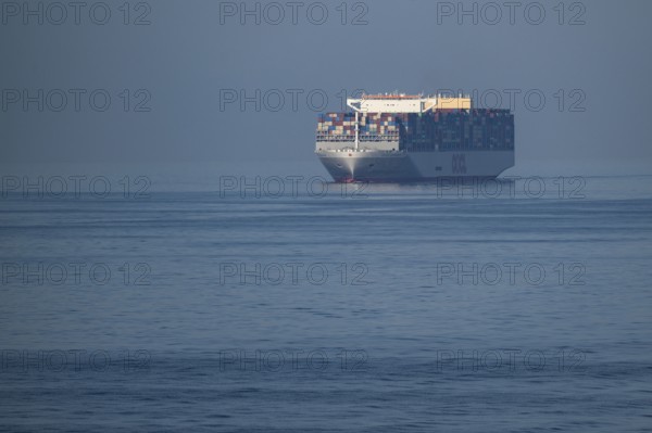 Container ship OOCL Denmark, 61m height, 399m length, Hong Kong flag, Baltic Sea