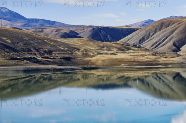 Mountains reflecting in Van Lake, Van, Turkey, Asia