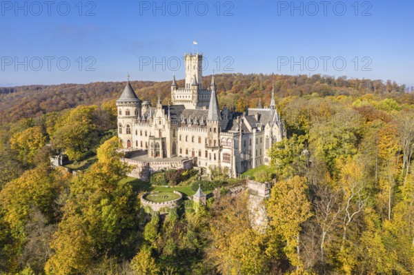 Drone shot of Castle Marienburg south from Hannover, on Mt Marienberg above river Leine, autumnal