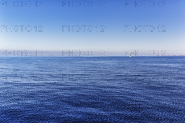 Strait, Strait of Bonifacio, sailboat on the horizon, blue sky, Mediterranean Sea, Bonifacio,