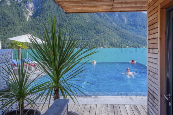Infinity swimming pool on the lakeshore, Pertisau, Achensee, Tyrol, Austria, Europe