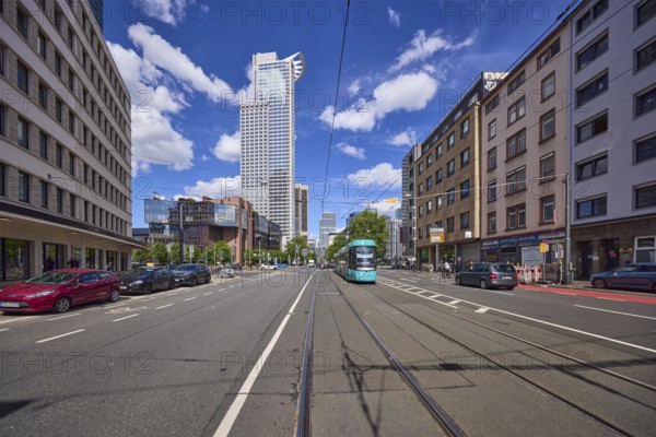 Kronenhochhaus or Westend 1, headquarters of DZ Bank, residential buildings and tram on Mainzer