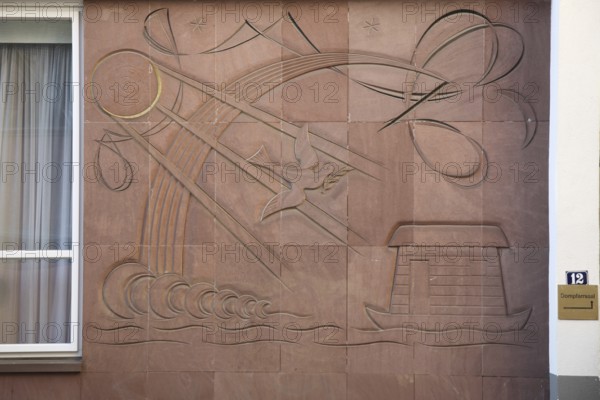 Sandstone relief on Domplatz, red, biblical, parable, ark, Noah, dove of peace in the old town,