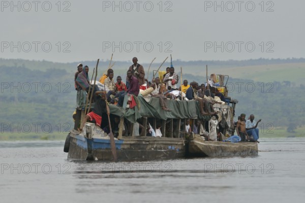 Overloaded boat on the Congo River, near Tshumbiri, Bandundu Province, Congo, Africa