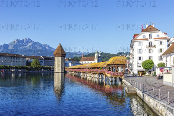 Lucerne city on the river Reuss with Chapel Bridge and Mount Pilatus in Lucerne, Switzerland,