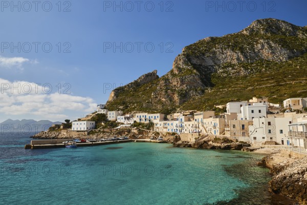Levanzo village, hills, white houses, green sea, Levanzo, Egadi Islands, Sicily, Italy, Europe