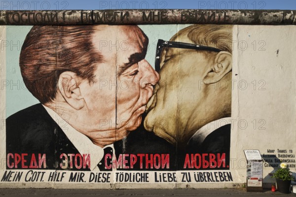 Brotherly Kiss, Brezhnev kisses Honecker, painting by Dmitri Vrubel on a remnant of the Berlin