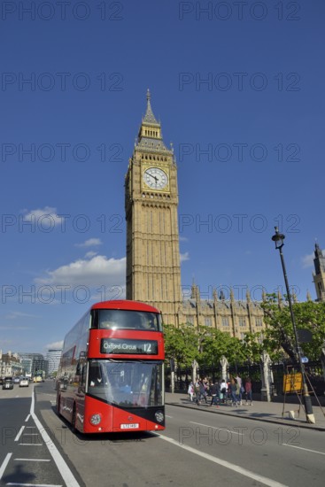 Red double-decker bus in front of the Big Ben, London, England, United Kingdom, Europe