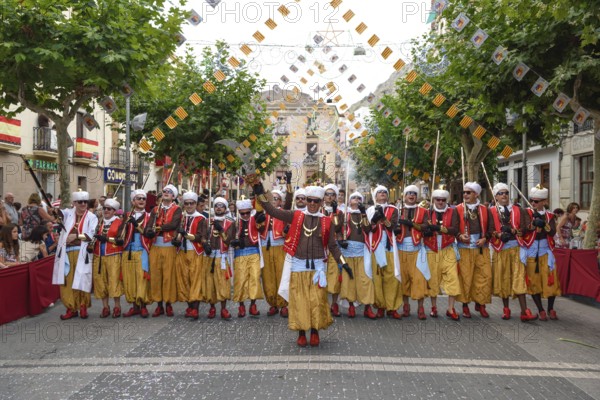 Group in traditional clothing, Moors and Christians Parade, Moros and Cristianos, Jijona or Xixona,